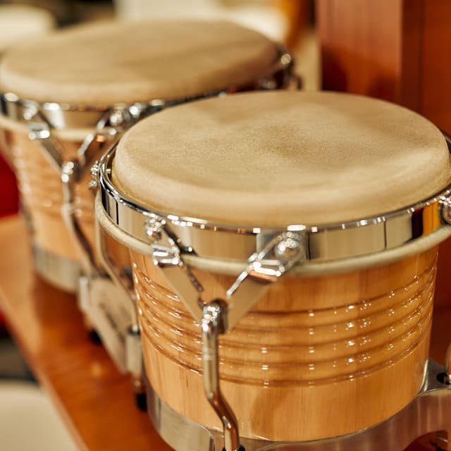 Background image of hand drums in a music store